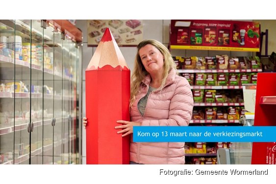 Ontmoet de lokale partijen bij debat en de verkiezingsmarkt